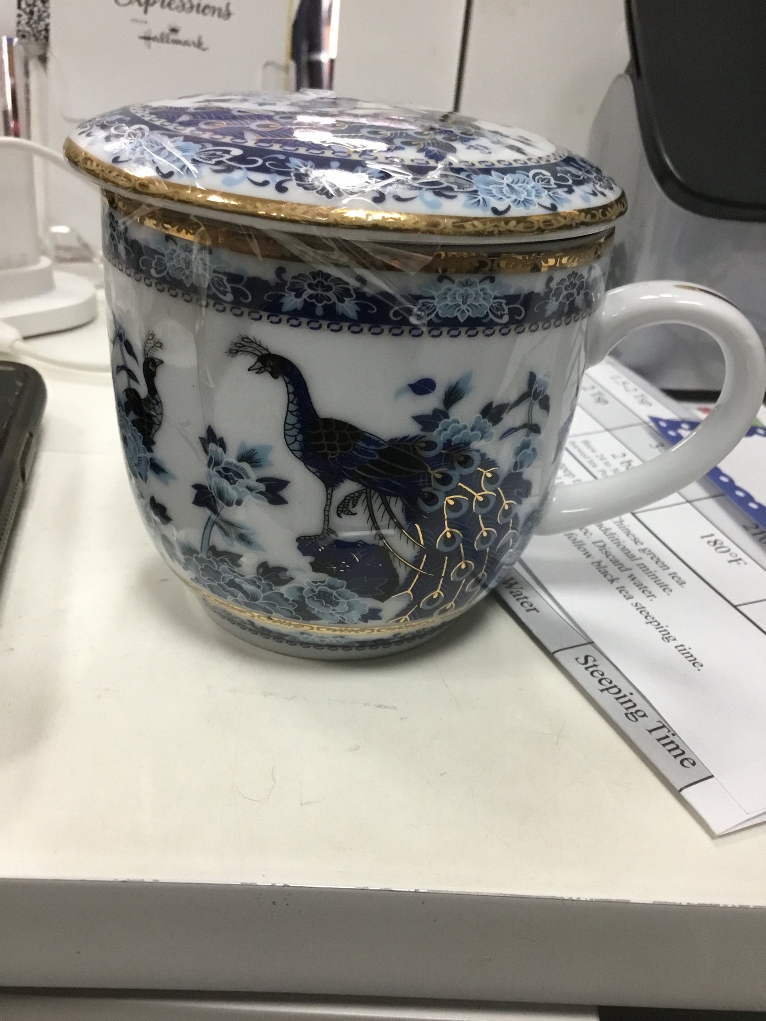 Peacock teacup