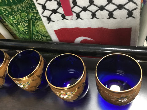 Gold and blue cups set