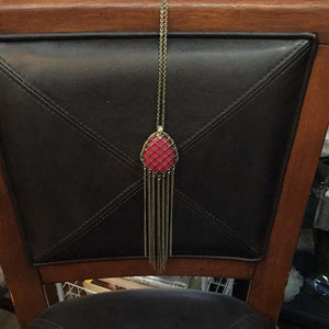 Incased red stone necklace