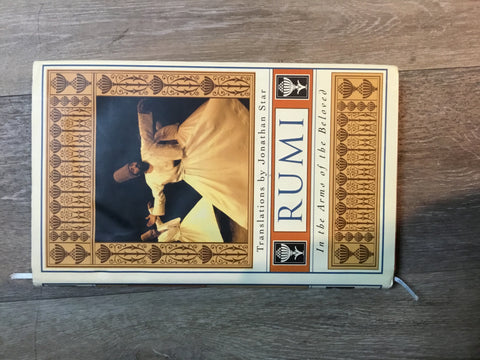 Rumi in the Arms of the Beloved