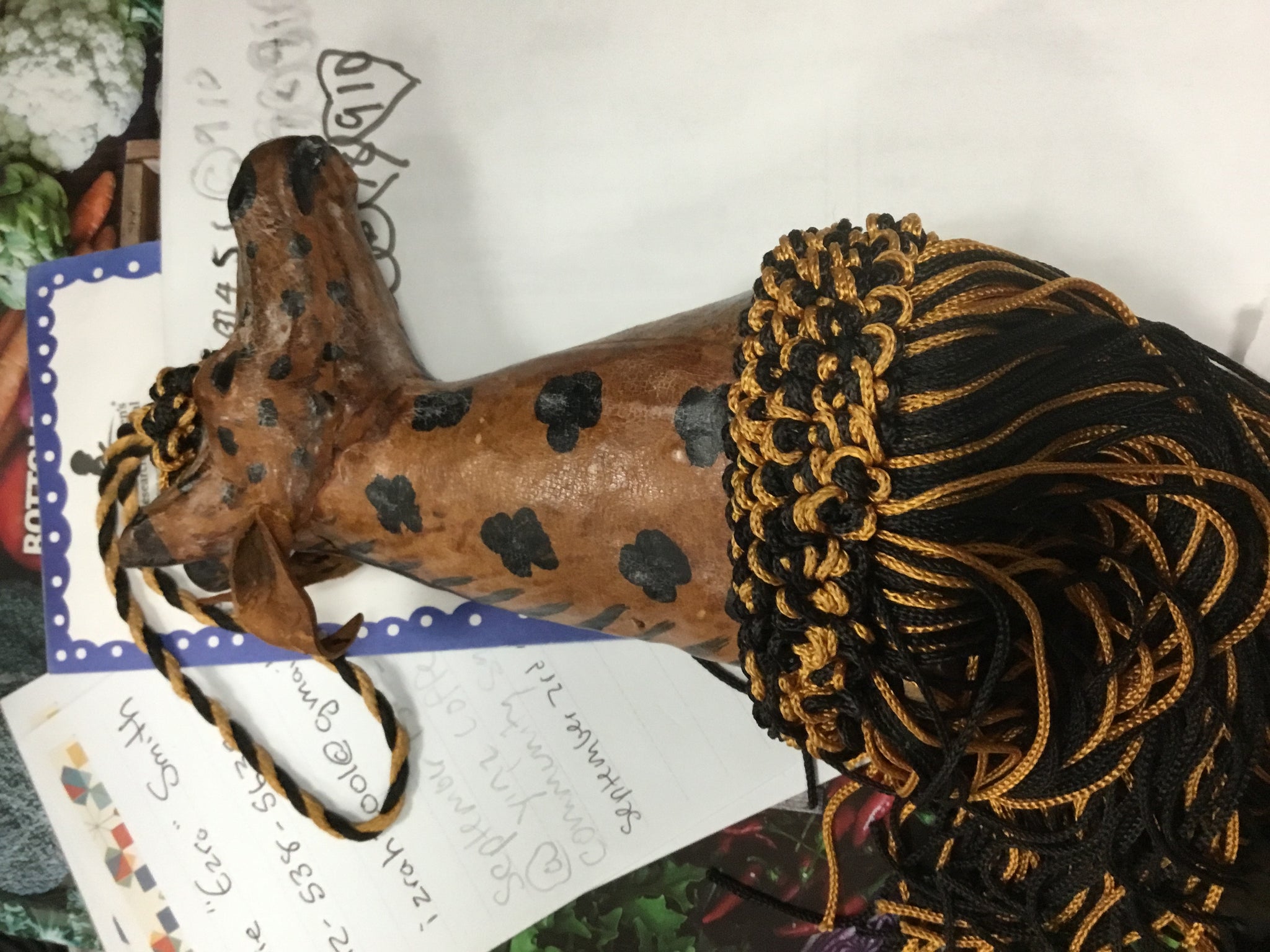 Giraffe with tassles