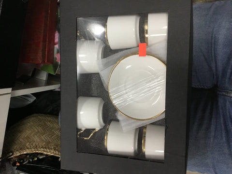 Gold and white tea cup set