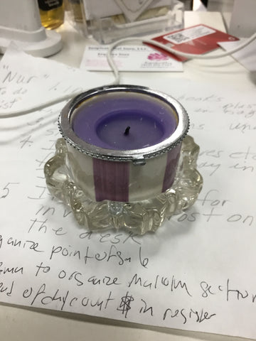 Purple candle with candle holder