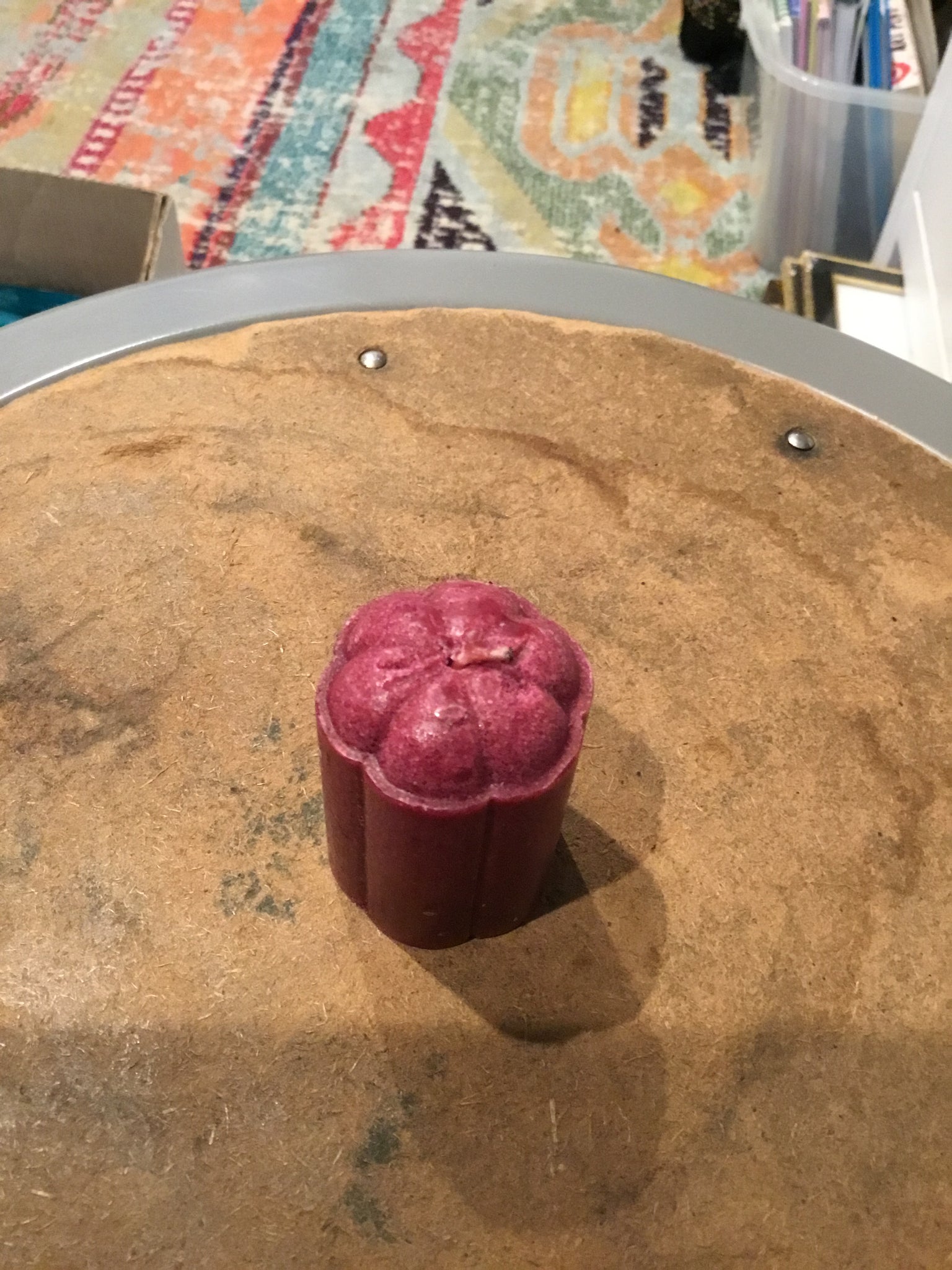 Purple candle without candle holder