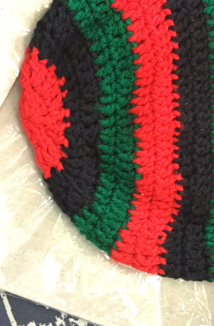 Knitted bk red and green hat