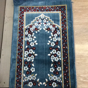 Blue and red prayer rug