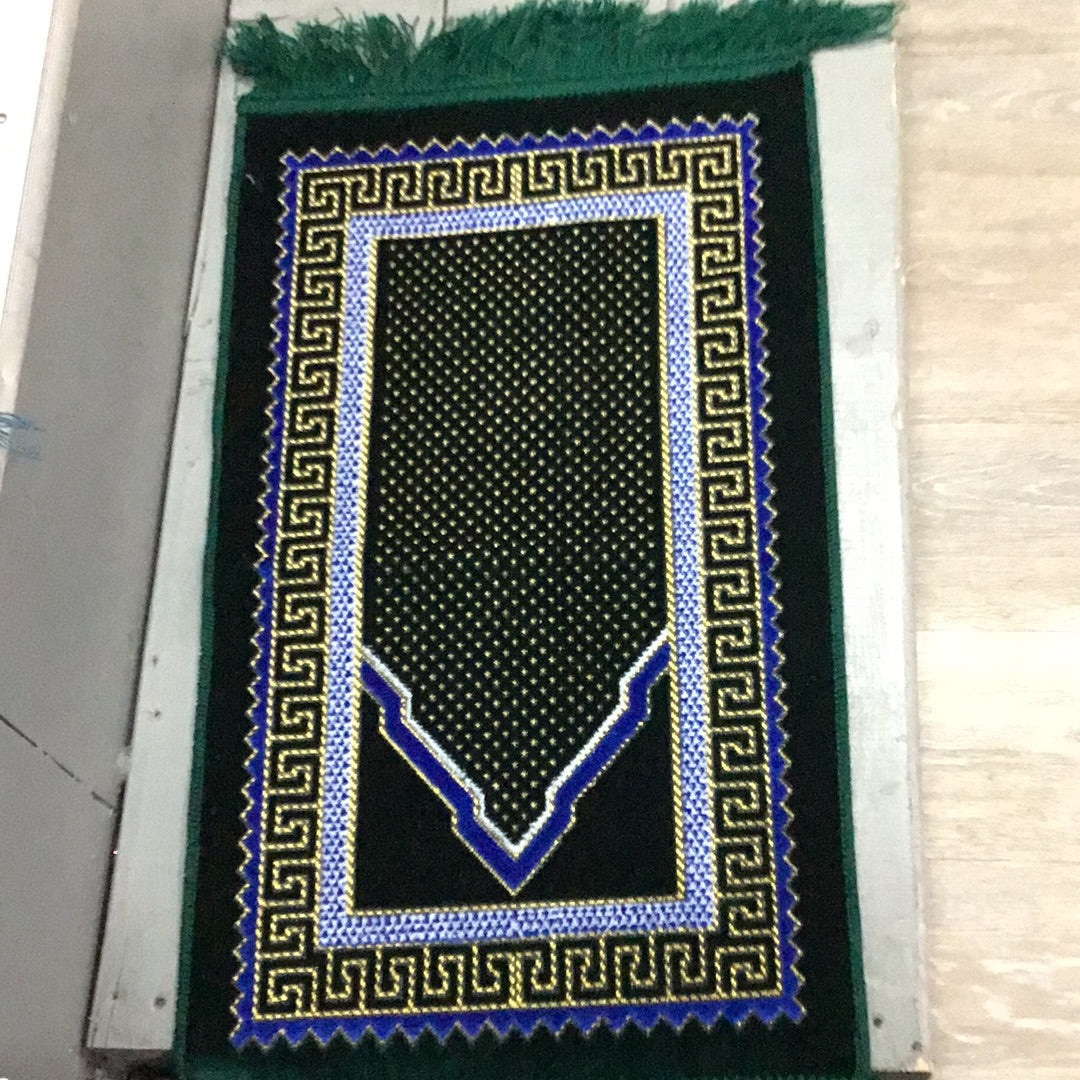 Green and blue prayer rug