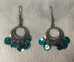 Circular blue sequin earrings
