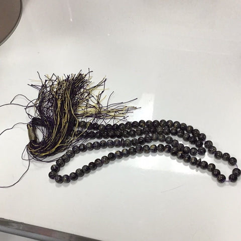 Purple prayer beads