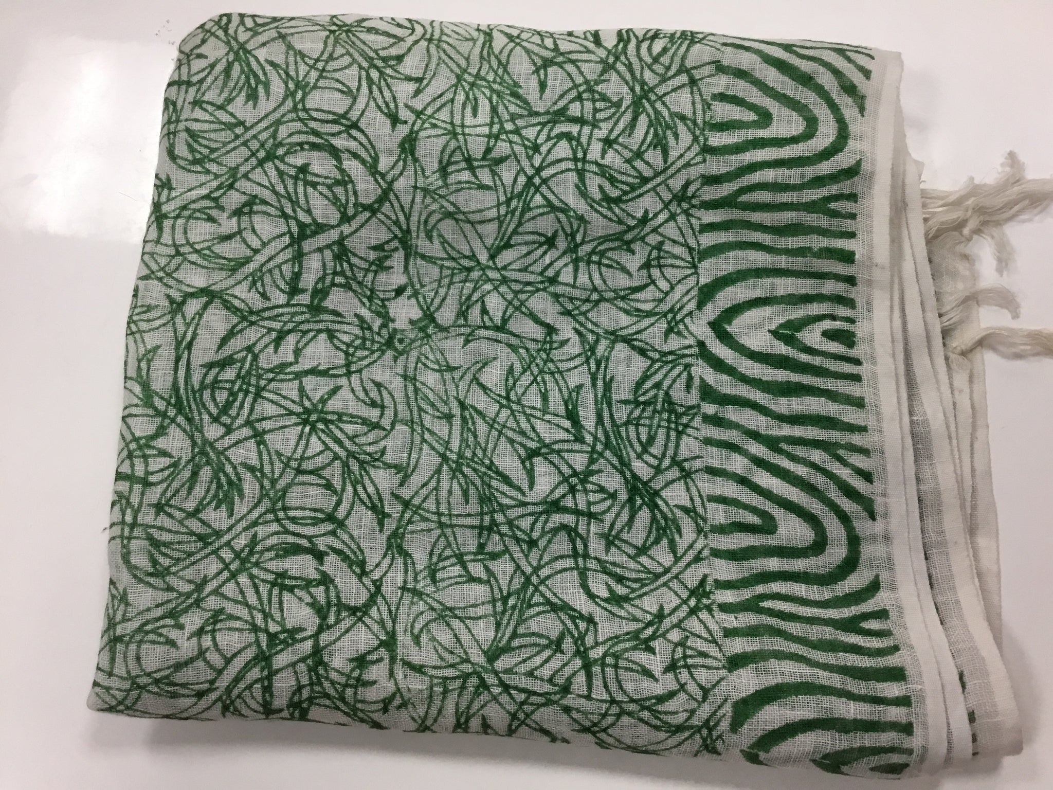 Green and white printed scarf