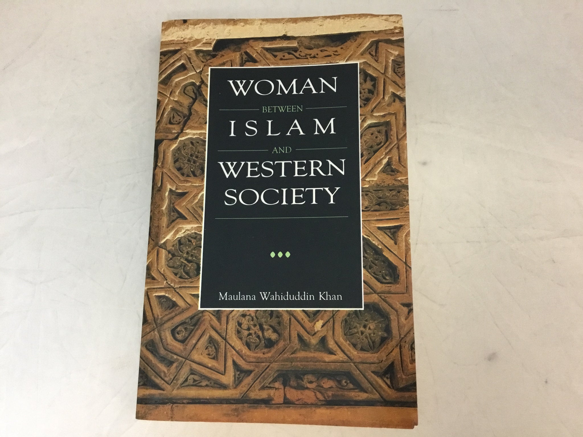 Woman Between Islam and Western Society