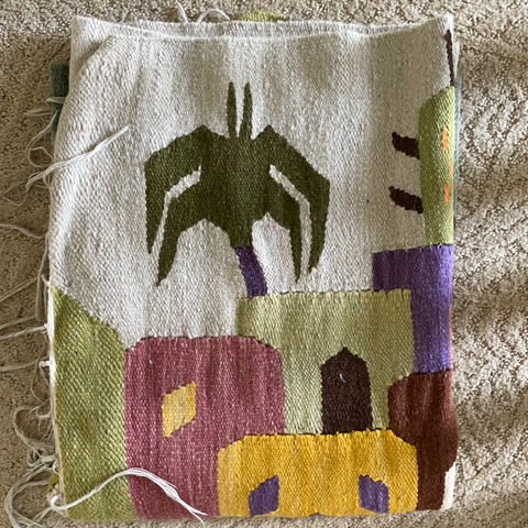 Egyptian handwoven rug with camel pictures