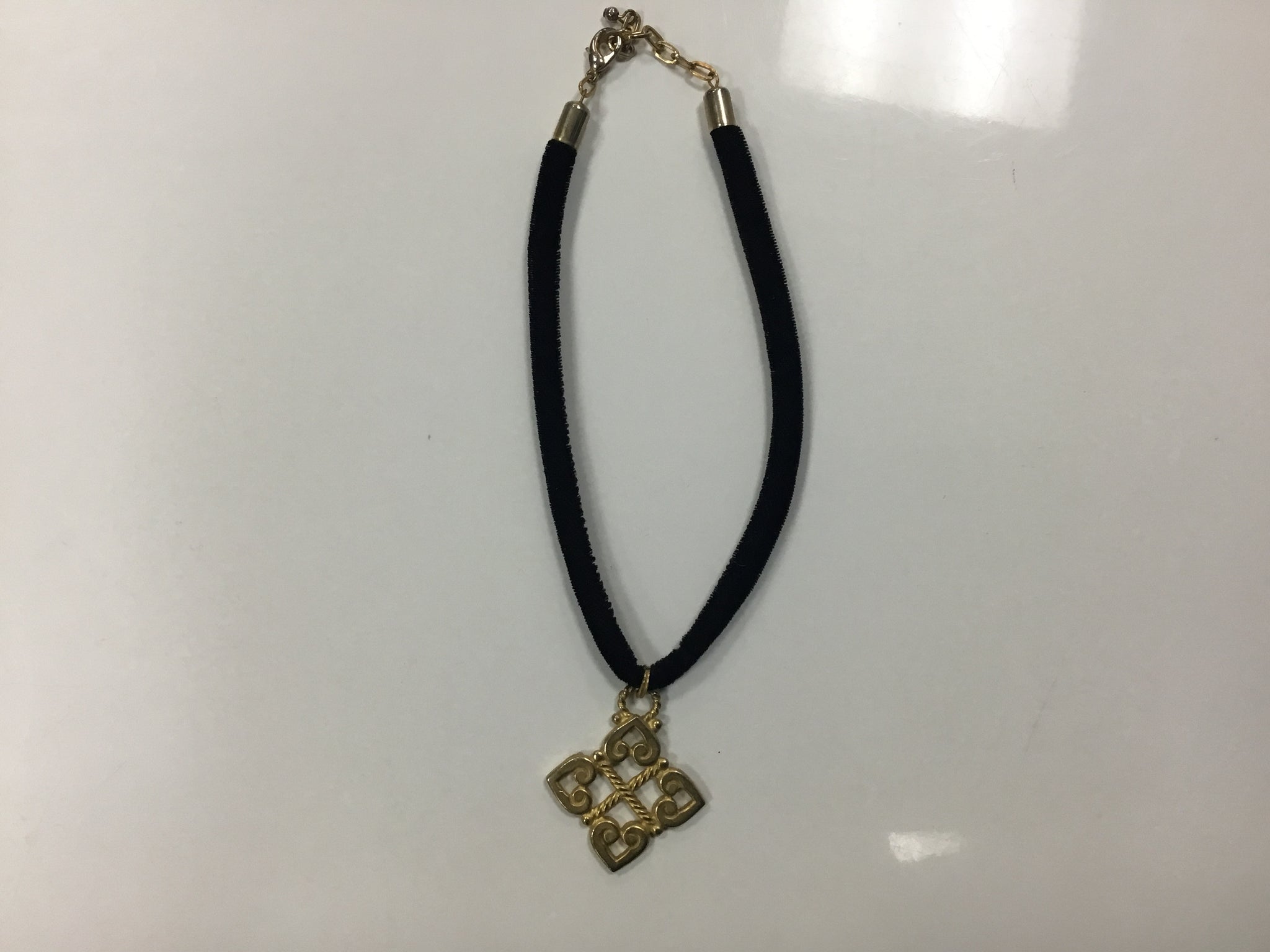 Black velvet cord necklace with a pendant