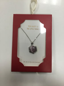 Necklace with a purple pendant