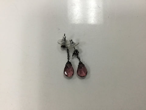 Earrings with purple stone